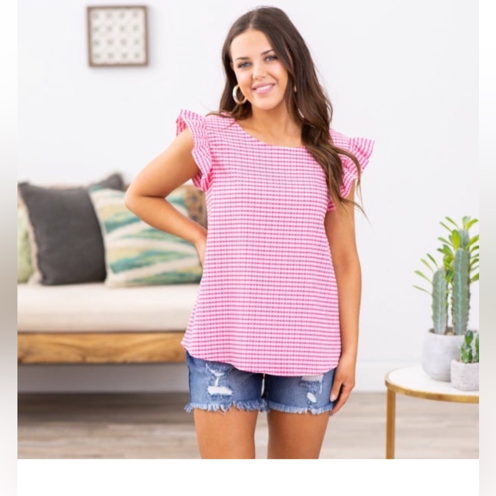 Women’s medium Les Amis top with flutter sleeves. Pink Gingham pattern size Med